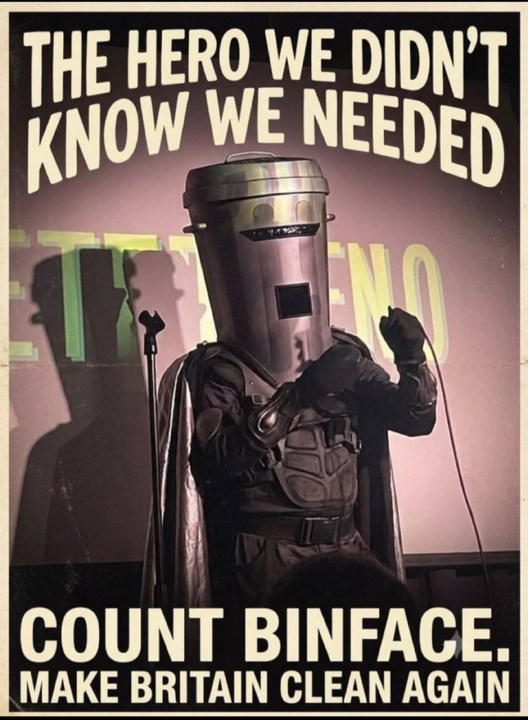 A person dressed as a superhero with a bin on their head called Count Binface is promoted as the hero we didn't know we needed with the slogan Make Britain Clean Again.